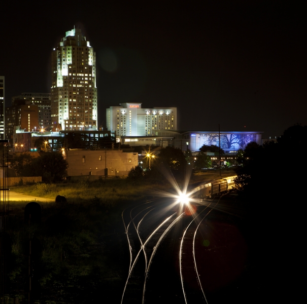 Raleigh at night with train